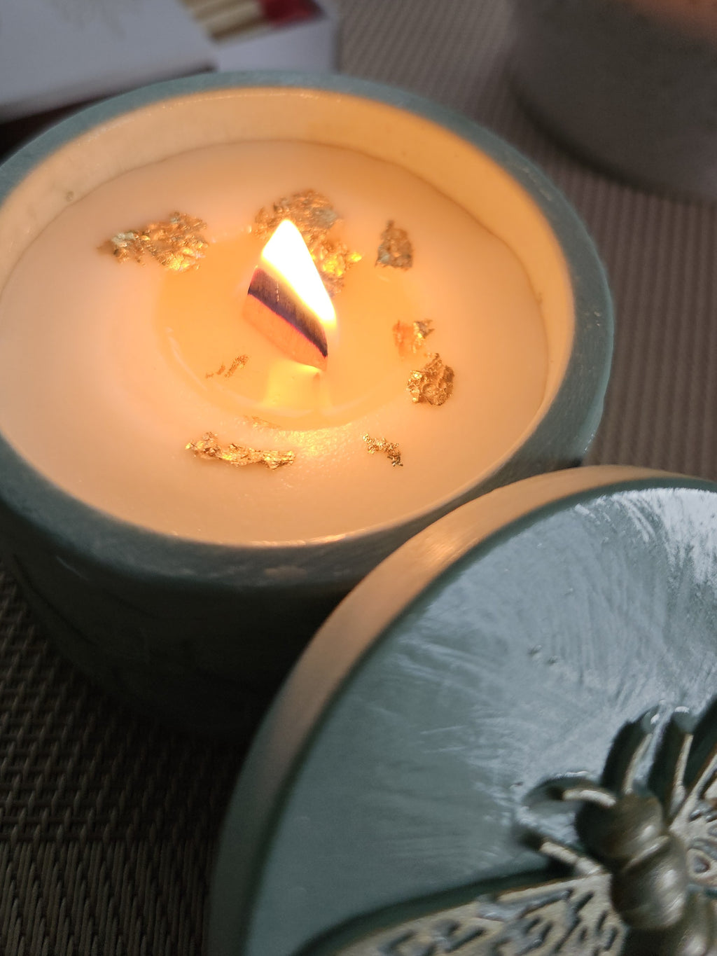 Soy candle with wooden wick burning softly on table – cozy home décor | Tobacco & Sweet Honey
