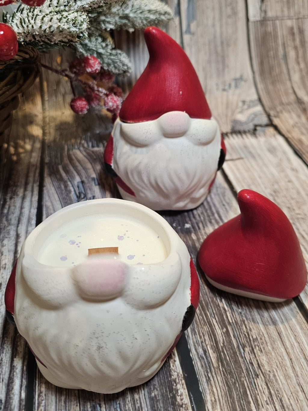 Santa soy candle – festive handcrafted candle in sculpted Santa figure with wooden wick and soft shimmer.
