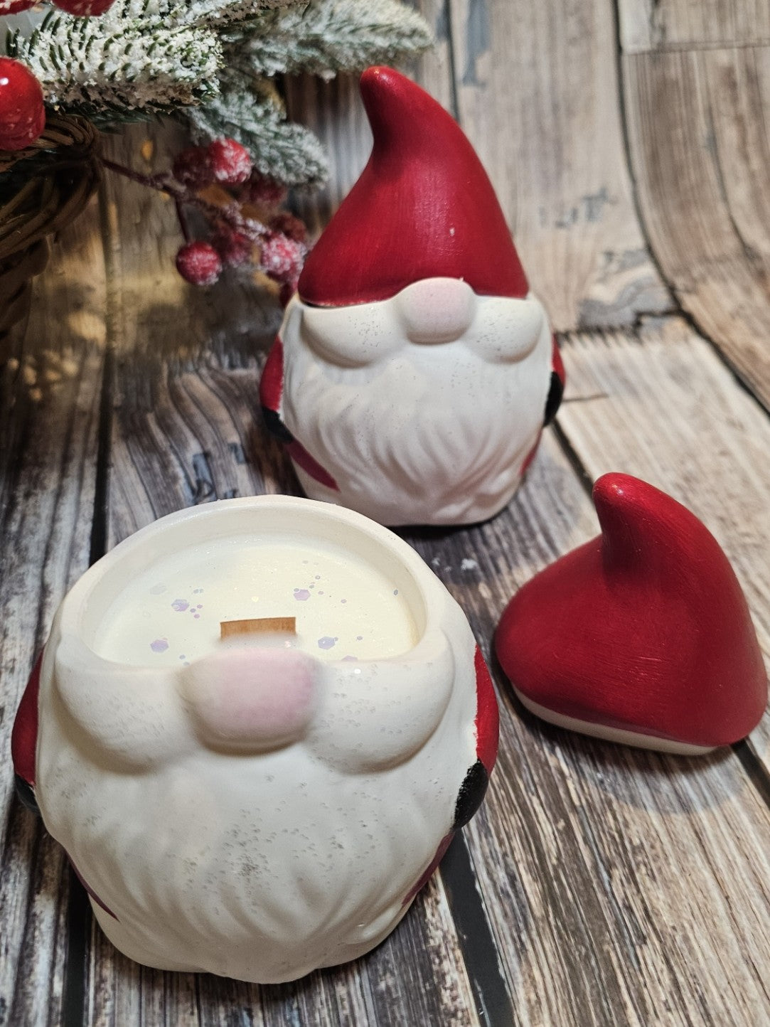 Santa soy candle – festive handcrafted candle in sculpted Santa figure with wooden wick and soft shimmer.