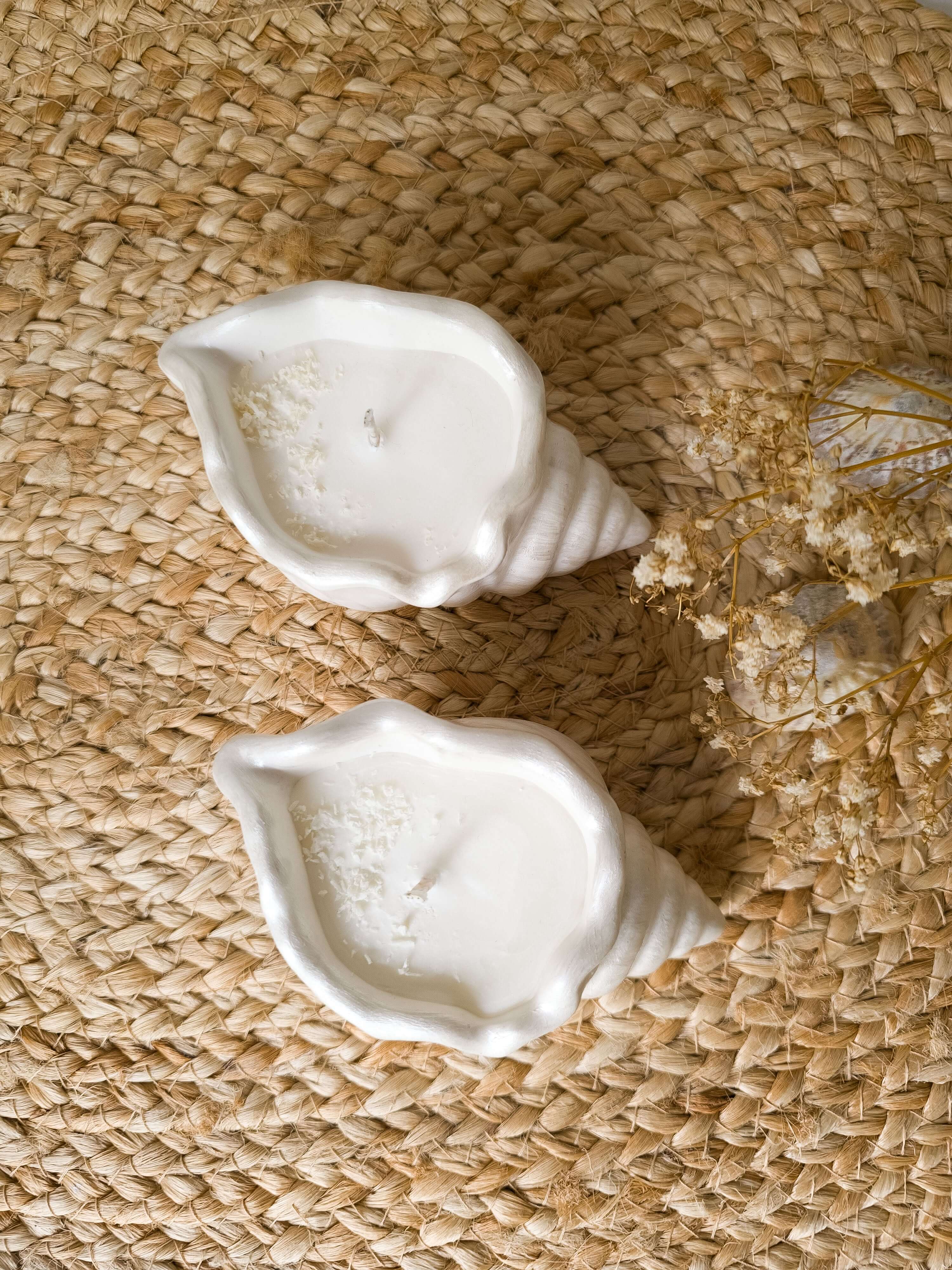 Ocean Breeze Set - Seashell Candle Duo featuring two handcrafted white soy candles on a woven background.