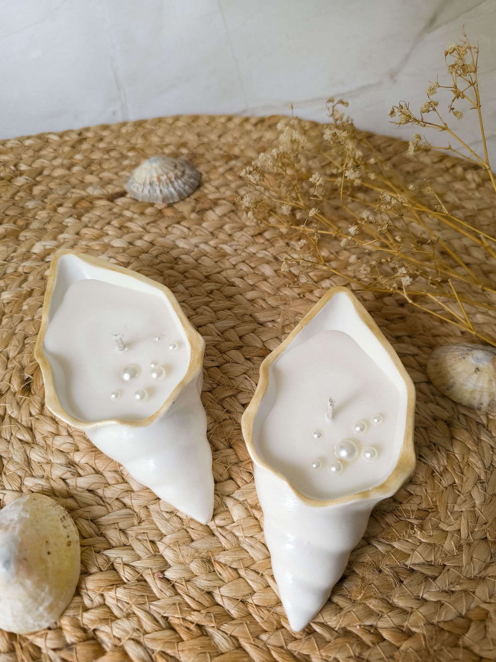 Seashell Gift Set - Silent Pearl Duo by Mellow Flame, featuring sculptural candles on a natural woven mat.